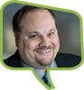 Headshot of Eric Behrens in a green speech bubble