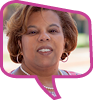 Headshot of Michelle Meekins-Davis in a pink speech bubble