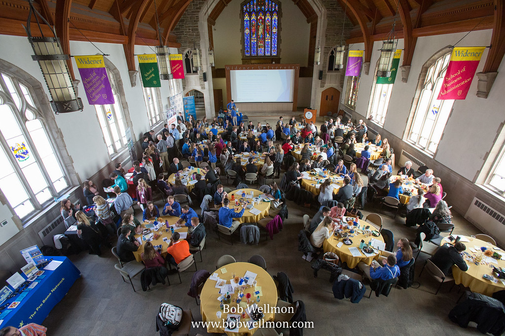 Overhead photo of a room with people at tables