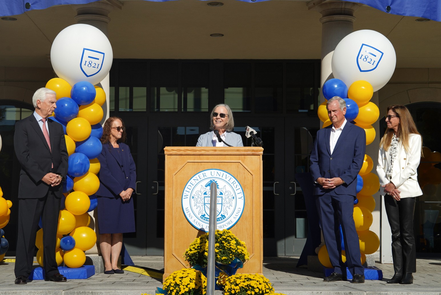 President Stacey Robertson delivering a speech during the Founders Hall Ribbon Cutting