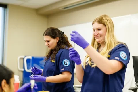 widener school of nursing undergraduate students prepare vaccines in nursing clinic near philadelphia