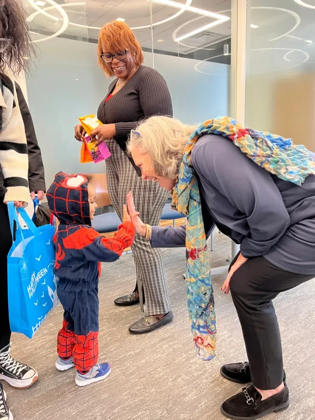 President Stacey Robertson and a CDC student
