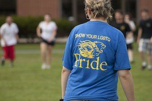 Person wearing LGBT+ shirt