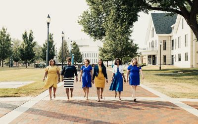 graduate continuing studies team walking