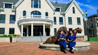 widener school of nursing undergraduate students sit outside founders hall in chester pennsylvania