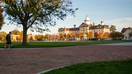 Fall day on Widener's campus with Old Main, the university's flagship building, in the background