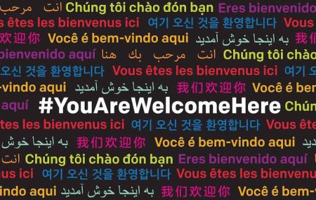 You Are Welcome Here word art with "you are welcome here" displayed in various languages