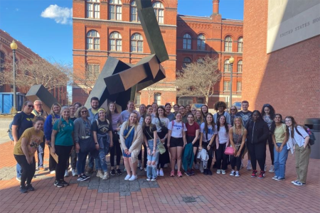 Education Majors in front of the Holocaust Museum in Washington D.C for their Urban Excursion trip