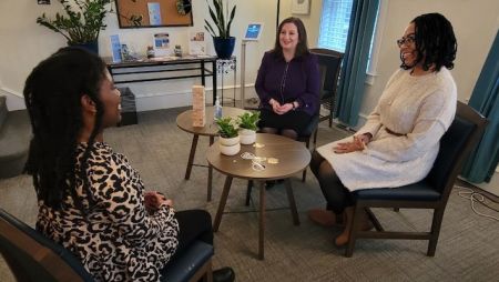 CAPs counselors sit down with a student to talk about mental health
