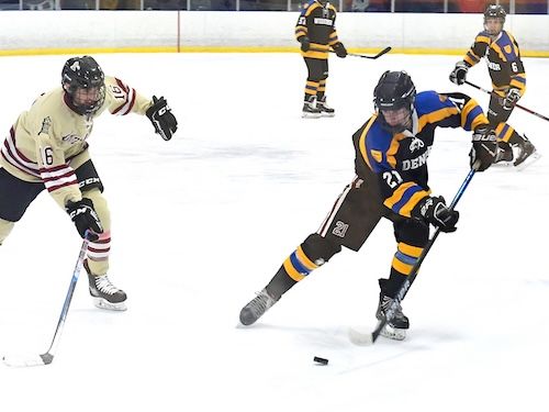 Widener hockey club player competing against rival team