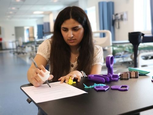Lydia Aruffo working on a project in the OT Maker's Lab.