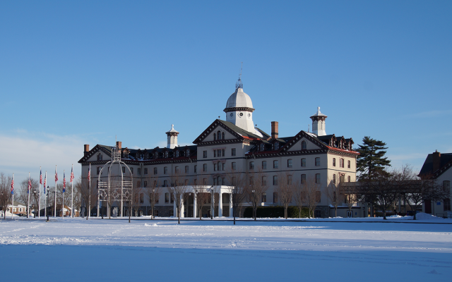 Widener's Old Main building with snow in the foreground 